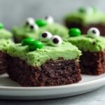 Spooky Gluten-Free Brownie Bites with Green Frosting & Candy Eyeballs